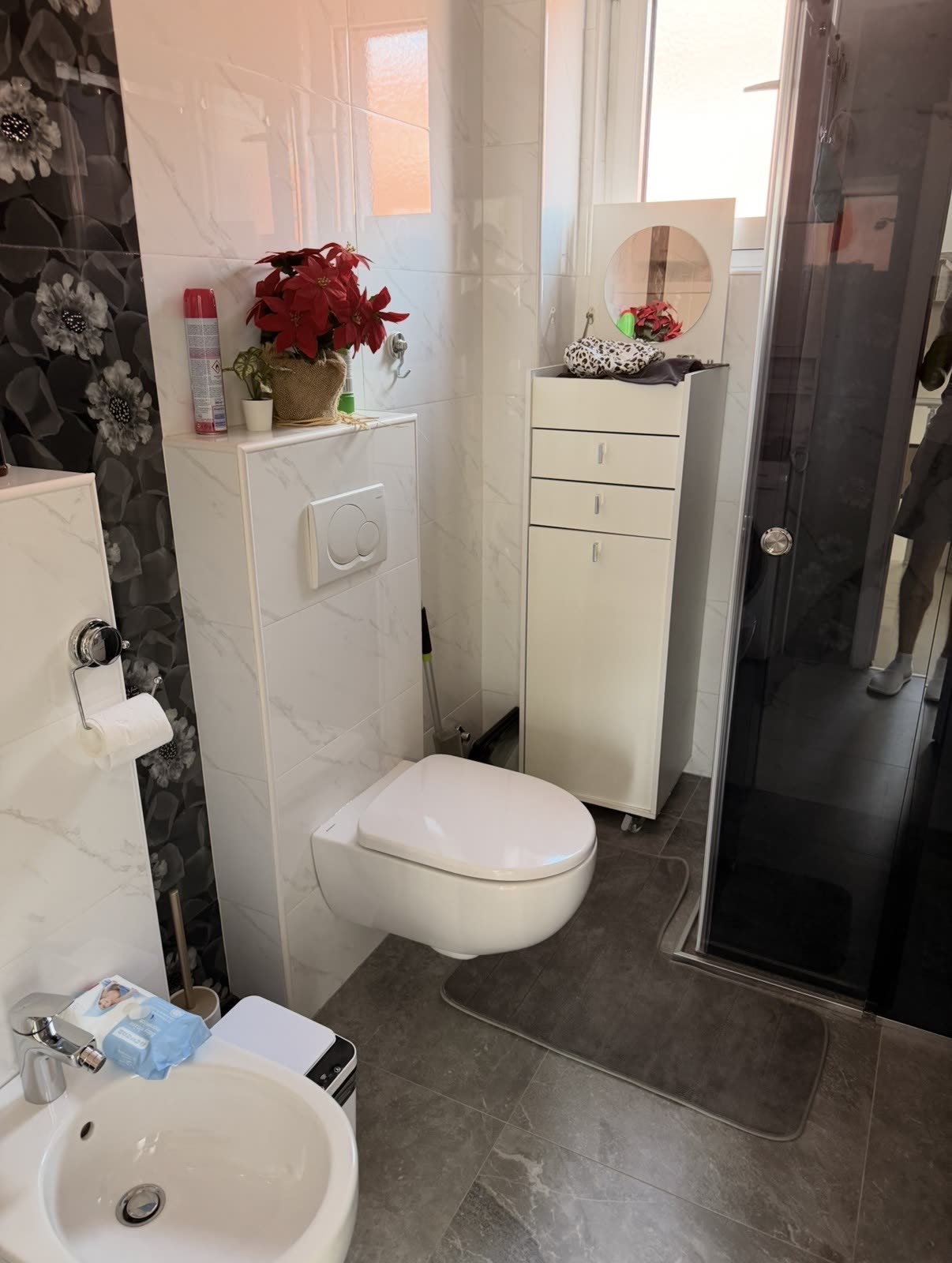 Detailed guest bathroom with polished fixtures after an Iconiq clean